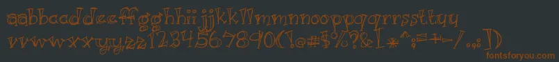 BmdJustKidding-fontti – ruskeat fontit mustalla taustalla
