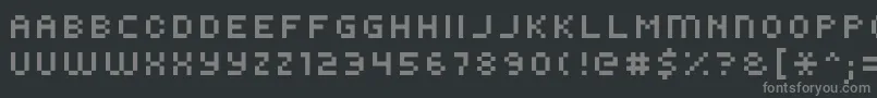 フォントKroeger0856 – 黒い背景に灰色の文字