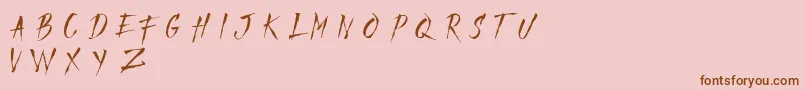 Шрифт MadfaithDemo – коричневые шрифты на розовом фоне