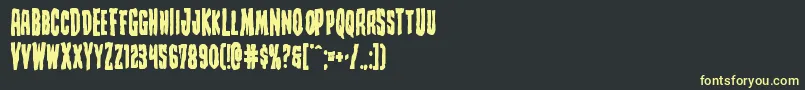 Creepycrawlersbold-fontti – keltaiset fontit mustalla taustalla