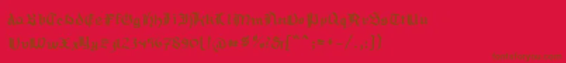 Mousefraktur Font – Brown Fonts on Red Background