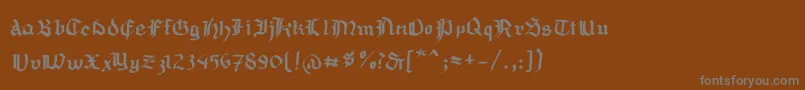 フォントMousefraktur – 茶色の背景に灰色の文字