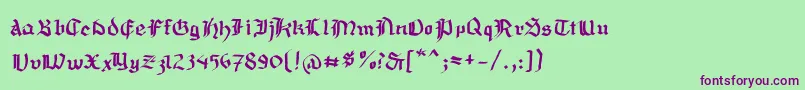 Mousefraktur Font – Purple Fonts on Green Background