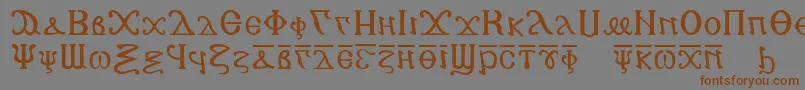 Copticalphabet-Schriftart – Braune Schriften auf grauem Hintergrund