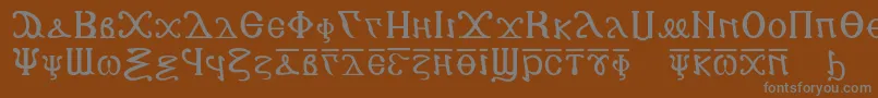 Fonte Copticalphabet – fontes cinzas em um fundo marrom