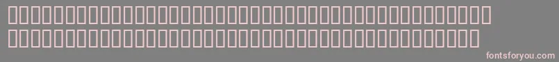 フォントYgnorant – 灰色の背景にピンクのフォント