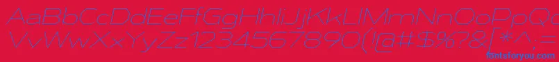 AthabascaExElIt Font – Blue Fonts on Red Background