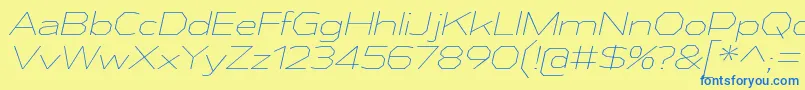 AthabascaExElIt Font – Blue Fonts on Yellow Background