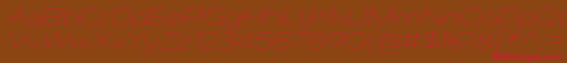 AthabascaExElIt-Schriftart – Rote Schriften auf braunem Hintergrund
