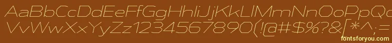 AthabascaExElIt Font – Yellow Fonts on Brown Background