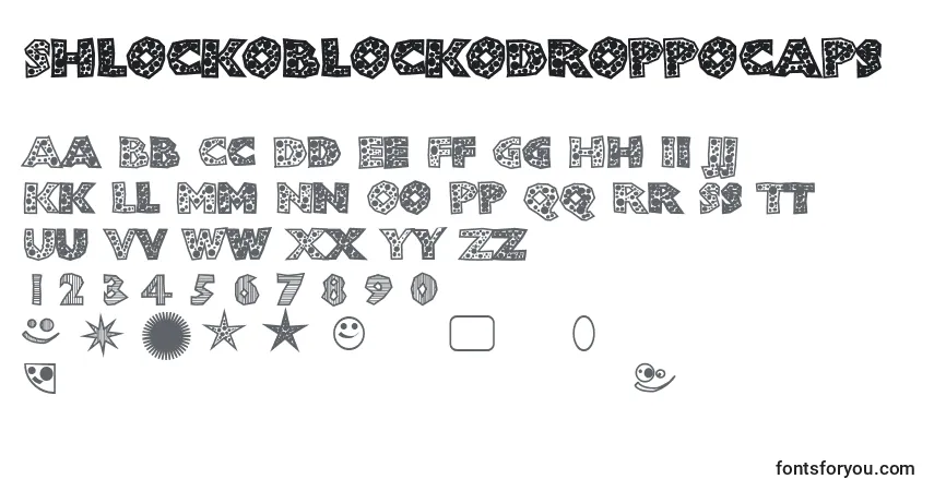 Czcionka Shlockoblockodroppocaps – alfabet, cyfry, specjalne znaki