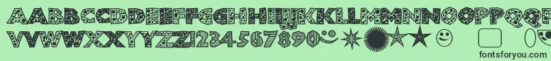 フォントShlockoblockodroppocaps – 緑の背景に黒い文字