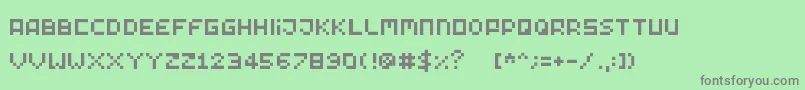 フォントTinypixy – 緑の背景に灰色の文字