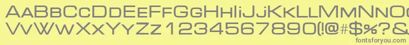 フォントMicradi – 黄色の背景に灰色の文字