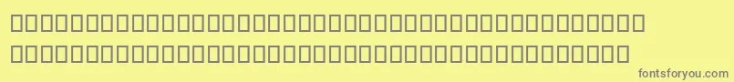 SteinbergNotation-fontti – harmaat kirjasimet keltaisella taustalla