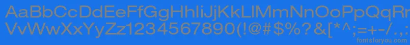 HelveticaneueltstdEx-fontti – harmaat kirjasimet sinisellä taustalla