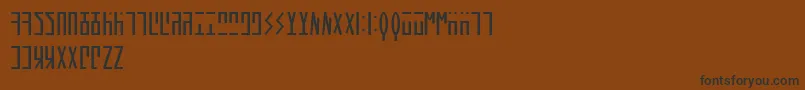 フォントAncientHand – 黒い文字が茶色の背景にあります
