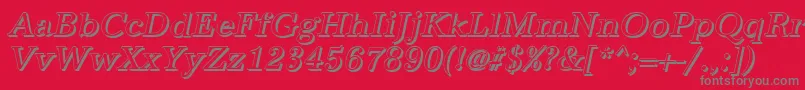 AntiquashItalic-fontti – harmaat kirjasimet punaisella taustalla