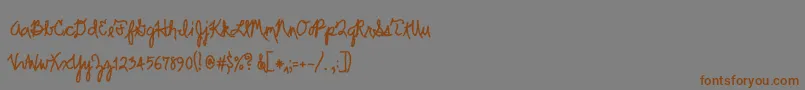 Scrawler-Schriftart – Braune Schriften auf grauem Hintergrund