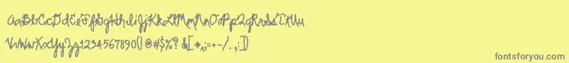 Scrawler-fontti – harmaat kirjasimet keltaisella taustalla