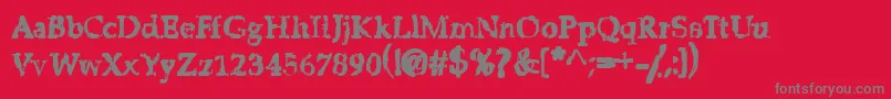 StripClubMotionSicknessGrungeDeluxe Font – Gray Fonts on Red Background