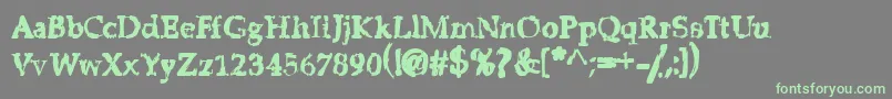 StripClubMotionSicknessGrungeDeluxe Font – Green Fonts on Gray Background