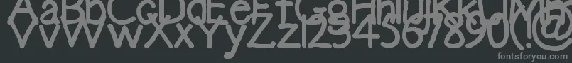 フォントEmma – 黒い背景に灰色の文字