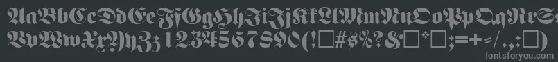 フォントFettefrakturRegular – 黒い背景に灰色の文字