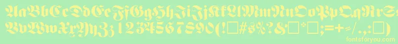 FettefrakturRegular Font – Yellow Fonts on Green Background