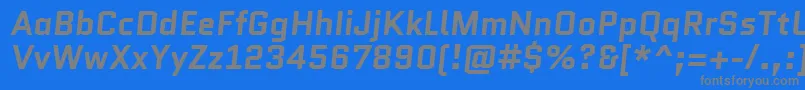 QuanticoBolditalic-Schriftart – Graue Schriften auf blauem Hintergrund