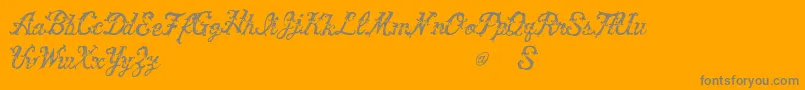 VtksVictory-Schriftart – Graue Schriften auf orangefarbenem Hintergrund