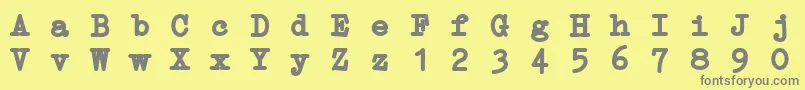 ErikaTypeBi-Schriftart – Graue Schriften auf gelbem Hintergrund