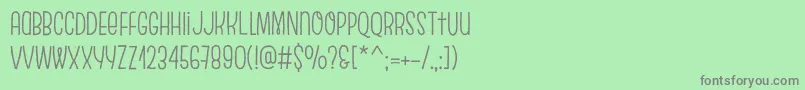 フォントEscalopeCrustTwo – 緑の背景に灰色の文字