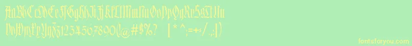 フォントHofstaetten – 黄色の文字が緑の背景にあります