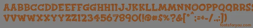 フォントFinkbold – 茶色の文字が灰色の背景にあります。