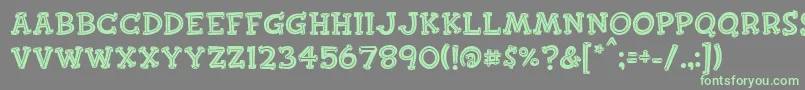 Finkbold Font – Green Fonts on Gray Background