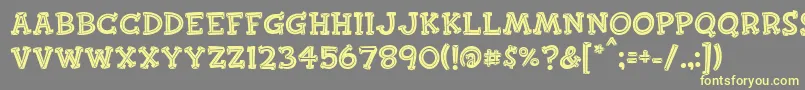 Finkbold Font – Yellow Fonts on Gray Background