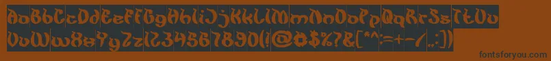 フォントKingCobraInverse – 黒い文字が茶色の背景にあります