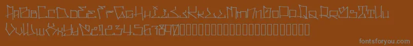 フォントWllWritrScrpt – 茶色の背景に灰色の文字