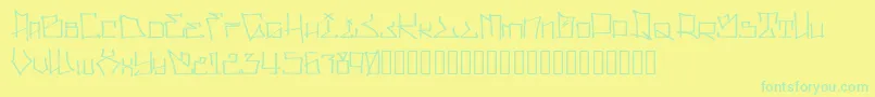 フォントWllWritrScrpt – 黄色い背景に緑の文字