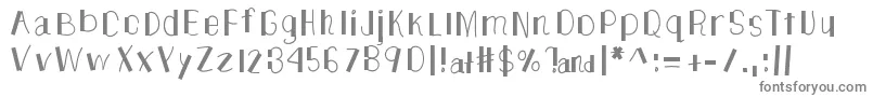 フォントTheUnknownSide – 白い背景に灰色の文字