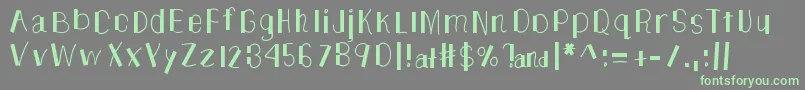 TheUnknownSide Font – Green Fonts on Gray Background
