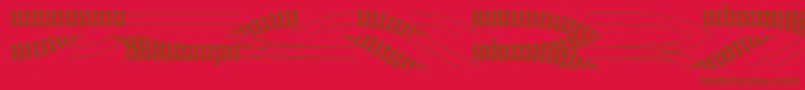 Traintracks Font – Brown Fonts on Red Background