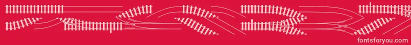 Traintracks Font – Pink Fonts on Red Background