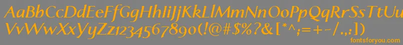 フォントLinotypeapertoBolditalic – オレンジの文字は灰色の背景にあります。