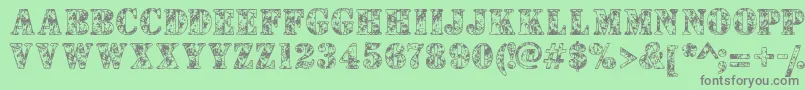 Camouflages Font – Gray Fonts on Green Background