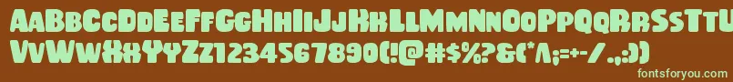 Rubberboy Font – Green Fonts on Brown Background