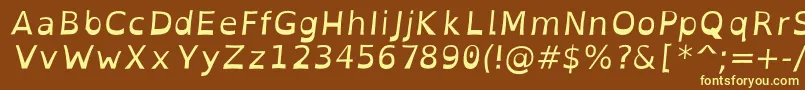 OpendyslexicItalic-fontti – keltaiset fontit ruskealla taustalla