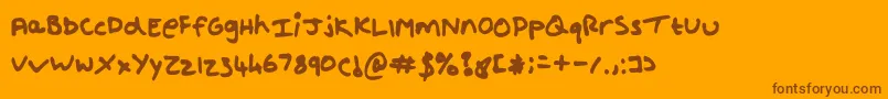 Czcionka Shout – brązowe czcionki na pomarańczowym tle