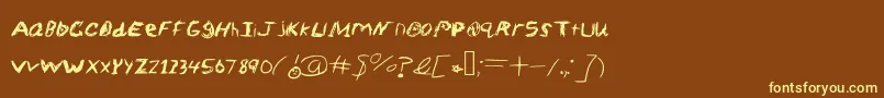 Шрифт SketchScoringFont – жёлтые шрифты на коричневом фоне